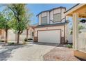 Beautiful two-story home with attached two-car garage and a paved driveway, showcasing curb appeal at 10360 Cherry Brook St, Las Vegas, NV 89183