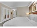 Relaxing bedroom featuring a king bed and easy access to the ensuite bathroom at 135 E Harmon Ave # 315, Las Vegas, NV 89109
