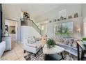 Inviting living room with modern decor, neutral colors, and stylish furniture at 1701 Drifters Peak St, Las Vegas, NV 89144