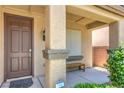 Inviting front porch with decorative column, Ring doorbell, and bench seating at 2189 De Narvik Dr, Henderson, NV 89044