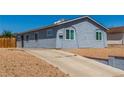 Inviting single-Gathering home with a long driveway and a neat front yard, perfect for suburban living at 2432 Spanish Ct, Las Vegas, NV 89108