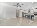 Bright, open-concept kitchen and living space with modern finishes and stainless steel appliances at 2771 Free Formed Ct, Las Vegas, NV 89138