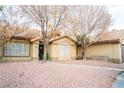 Charming single-story home featuring a tile roof and low-maintenance landscaping at 3436 N Tenaya Way, Las Vegas, NV 89129