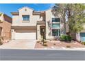 Daytime view of the two-story home with a tile roof, two-car garage, and easy-care landscaping at 4016 Owlshead Mountain St, Las Vegas, NV 89129