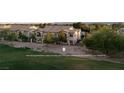 Townhome exterior features east facing windows and golf course and mountain views at 4970 Black Bear Rd # 101, Las Vegas, NV 89149