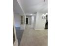 Hallway features tile flooring, a built in cabinet, and neutral paint at 5316 Fieldstone Rd, Las Vegas, NV 89107