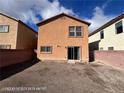 Backyard with block wall fence and potential for landscaping at 7464 Edgecove Ct, Las Vegas, NV 89139