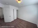 Clean and spacious bedroom with neutral carpet and closet at 7464 Edgecove Ct, Las Vegas, NV 89139