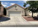 Charming single-story home with well-maintained stucco, red tile roof and a spacious two car garage at 7620 Donald Nelson Ave, Las Vegas, NV 89131