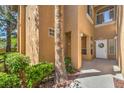 Condo exterior showing front door and desert landscaping at 8737 Red Brook Dr # 204, Las Vegas, NV 89128