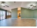 Open-concept floor plan showcasing a living area connecting to kitchen and additional living space at 904 Big Horn St, Henderson, NV 89002