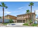 Inviting two-story home featuring well-maintained landscaping and an attached three-car garage at 9746 Driftwood Island Ct, Las Vegas, NV 89148