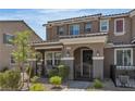 Charming townhome with desert landscaping and a gated front porch, perfect for enjoying the outdoors at , Henderson, NV 89044