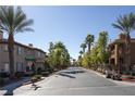 Picturesque street view showcasing lush landscaping and well-maintained homes in a tranquil neighborhood at 10291 Delta View Ct # 101, Las Vegas, NV 89129