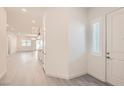 Bright foyer showcasing the open-concept layout, with modern flooring and clean, white walls at 157 Sarabeth St, Las Vegas, NV 89138
