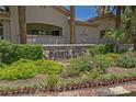 Resort Villas signage with lush landscape, shrubs and flowers at 2050 W Warm Springs Rd # 224, Henderson, NV 89014