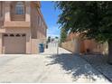 Long driveway leading to a detached garage with convenient side yard access at 2728 Aspen Wood Ave, Henderson, NV 89074