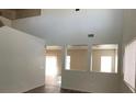 Open-concept living space with ample natural light and neutral color palette at 3021 New Journey Way, North Las Vegas, NV 89031