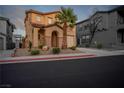 Charming home with desert landscaping, a garage, complemented by a private balcony, all within close proximity to the street at 1136 Paradise Garden Dr, Henderson, NV 89002