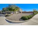 Spacious front yard with desert landscaping, providing a clean and low-maintenance aesthetic at 1317 Hopespring Loop Ave, North Las Vegas, NV 89084