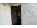 Apartment entrance showing door with security gate at 1701 E Katie Ave # 91, Las Vegas, NV 89119