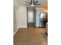 Open hallway with tile floors and modern lighting, offering ample space and storage at 2025 Cary Grant Ct, Las Vegas, NV 89142