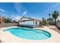 Backyard view showcasing a refreshing in-ground swimming pool with plenty of space for outdoor seating at 2116 Cameron St, Las Vegas, NV 89102