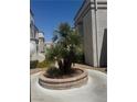 Courtyard featuring well-maintained plants, walkways, and seating areas offers a serene retreat at 3150 Soft Breezes Dr # 1040, Las Vegas, NV 89128