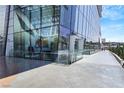 Modern glass building with sleek design and inviting entrance, highlighting contemporary architecture at 3726 Las Vegas Blvd # 1809, Las Vegas, NV 89158