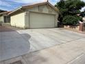 Charming single-story home with a two-car garage and a well-maintained concrete driveway at 4113 Arcola Ave, Las Vegas, NV 89110