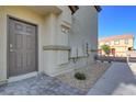 Exterior entry door featuring a modern design at 7505 Emerald Stars St # 101, North Las Vegas, NV 89084