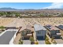 Aerial view of a neighborhood showcasing well-maintained homes with desert landscape at 8261 Selenite St, Las Vegas, NV 89113