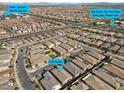 Aerial view showcases the neighborhood, highlighting proximity to amenities like Skye Center and Cafe Rio at 8705 Fordster St, Las Vegas, NV 89166