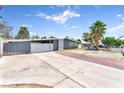 Single story home with brick and cement driveway and desert rock landscaping in the front yard at 1713 E Bonanza Rd, Las Vegas, NV 89101