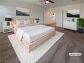 Serene main bedroom featuring plush carpeting, neutral tones, and ample natural light at 6918 Dandelion Park Ave, Las Vegas, NV 89113