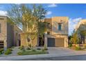 Modern two-story home with a two-car garage and well-maintained landscaping at 778 Horizon Canyon Dr, Henderson, NV 89052