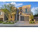 Modern two-story home with a two-car garage and well-maintained landscaping at 778 Horizon Canyon Dr, Henderson, NV 89052