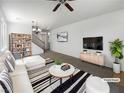 Bright living room with sleek furniture, modern lighting, and stylish decor at 8253 Pearl Oasis Ct, Las Vegas, NV 89139