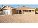 Charming single-story home with low-maintenance front yard and attached garage at 1509 Lucilee St, Las Vegas, NV 89101