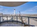 Balcony showcases an expansive city view, featuring the iconic Stratosphere Tower under a clear blue sky at 222 Karen Ave # 2308, Las Vegas, NV 89109
