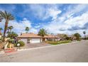 Lovely single-story home with a tile roof, two-car garage, and well-maintained landscaping at 3236 Cliff Sieler Ct, Las Vegas, NV 89117