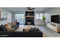 Modern living room features black fireplace, ceiling fan, and large windows at 3484 Nightflower Ln # B, Las Vegas, NV 89121