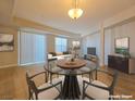 Bright living area with an open layout featuring comfortable seating and stylish decor at 38 E Serene Ave # 432, Las Vegas, NV 89123