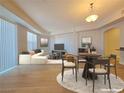 Sunlit living room featuring modern furnishings and hardwood floors for a warm and inviting space at 38 E Serene Ave # 432, Las Vegas, NV 89123