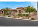 Beautiful single-story house with a well-maintained lawn and an attached two-car garage at 398 Frank Case Ln, Henderson, NV 89011