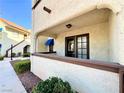 A covered balcony showing an outdoor living space at 6137 W Oakey Blvd # A, Las Vegas, NV 89146