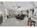 Spacious living room with modern furnishings, stylish decor, and natural light at 10484 Rose Park Ave, Las Vegas, NV 89135