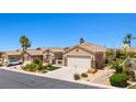 Beautiful single-story home featuring desert landscaping, a tile roof, and a two-car garage at 1309 Vista Del Monte Dr, Mesquite, NV 89027