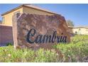 Welcome to Cambria: A decorative stone sign marking the entrance to a desert community at 320 Point Loma Ave, North Las Vegas, NV 89031