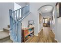 Inviting entryway with a staircase and decoratively tiled floors at 320 Point Loma Ave, North Las Vegas, NV 89031